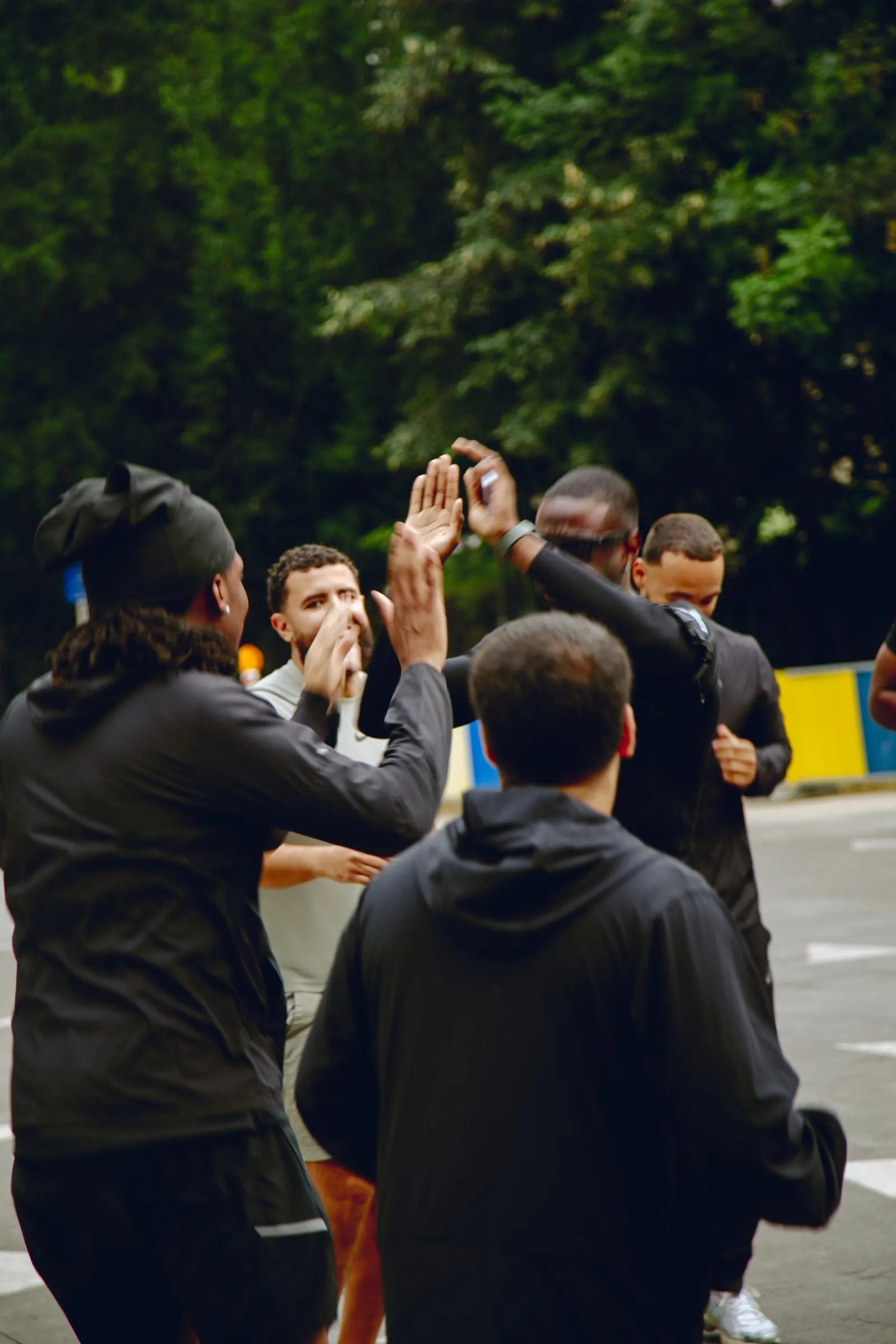 Club members giving each other high fives