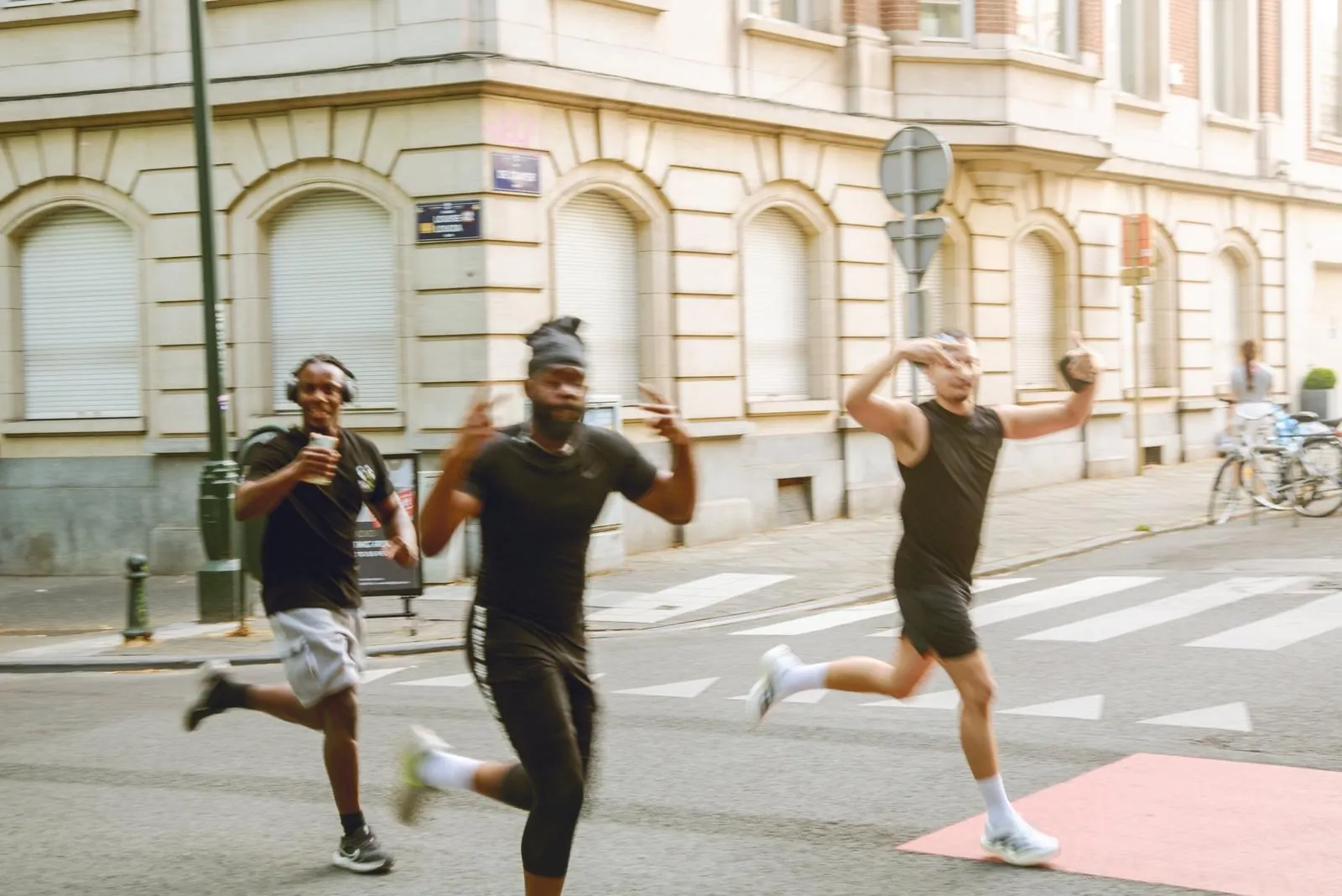 Runners crossing a street in Ixelles