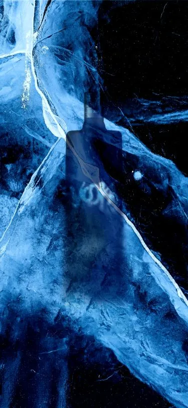 Bottle seen through blue ice